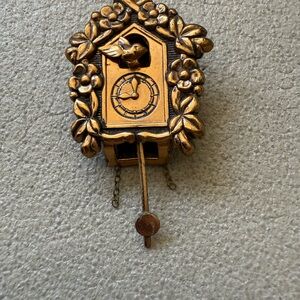 Vintage Cuckoo Clock Bird Brooch Pin in Gold Color and Designer Stamp